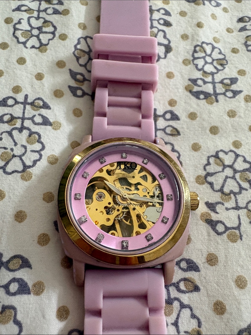 TKO Pink and Gold Skeleton Dial Watch with Crystal Markers